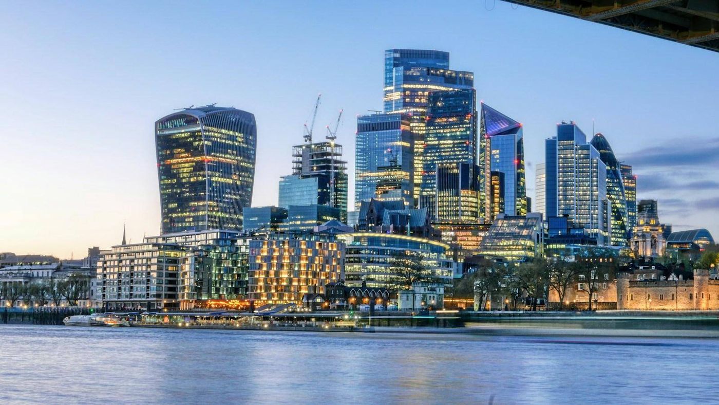 City of London skyline across the Thames at dusk